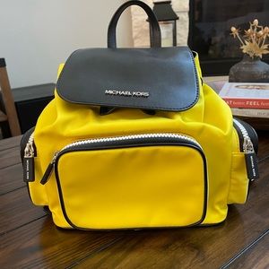 Michael Kors mini backpack.